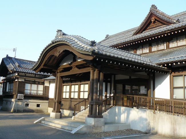 �������a