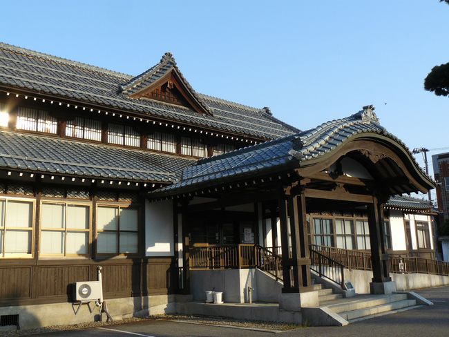 �������a